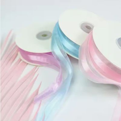 अच्छी कीमत पॉलिएस्टर डबल फेस ऑर्गनजा रिबन रोल 1 इंच चौड़ाई शादी के लिए शिल्प उपहार धनुष ऑनलाइन