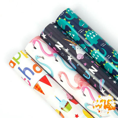 खरीदें बच्चों के लिए फ्लेमिंगो और डायनासोर गोल्ड गिफ्ट रैप पेपर रोल कार्टून डिजाइन ऑनलाइन निर्माण