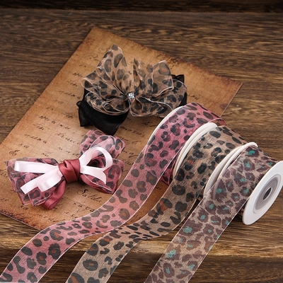 अच्छी कीमत तेंदुए प्रिंट बर्फ रिबन DIY हस्तनिर्मित धनुष बाल सामान बुना हुआ रिबन पुआल टोपी जूता बनाने के फीता सामान बनाने उपहार बॉक्स पैकेजिंग रिबन ऑनलाइन