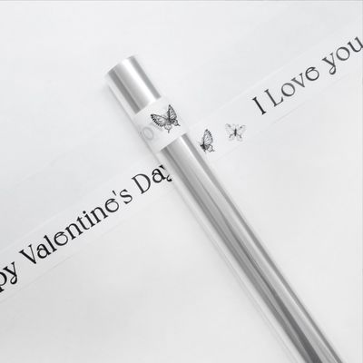 अच्छी कीमत रोमांटिक फूल लपेटने का कागज पारदर्शी ओपीपी सेलफेन रोल डीवाई पैकेजिंग के लिए 57*1000 सेमी ऑनलाइन