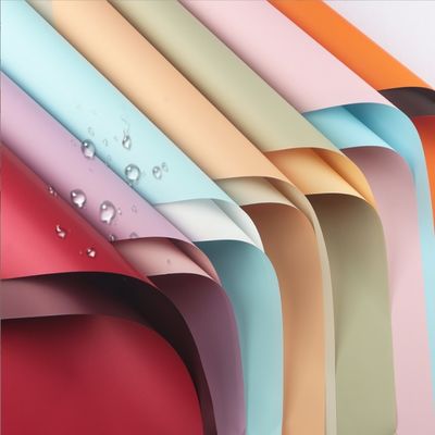 अच्छी कीमत सीमा पार जलरोधक मोटा दो रंग का ओय्या कागज उपहार और फूल कला के लिए फूल लपेटने का कागज प्लास्टिक सामग्री ऑनलाइन